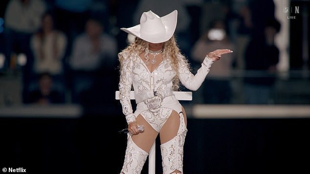 Beyoncé sparks a frenzy on social media when she shows off a bold gesture during the halftime show in her first appearance since Jay-Z's rape allegation.