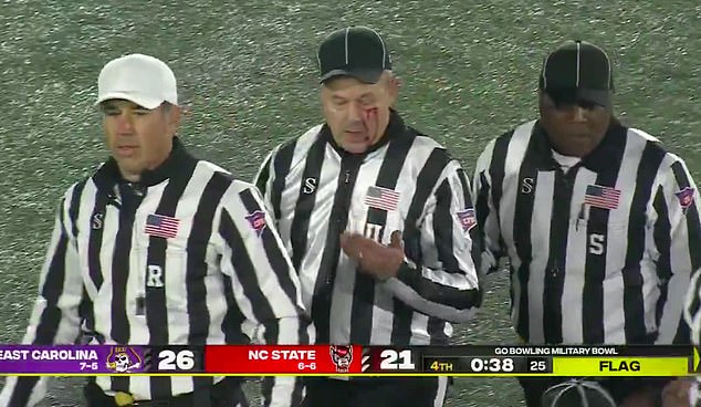 Referee left bloodied after suffering gruesome cut in wild brawl at college football game