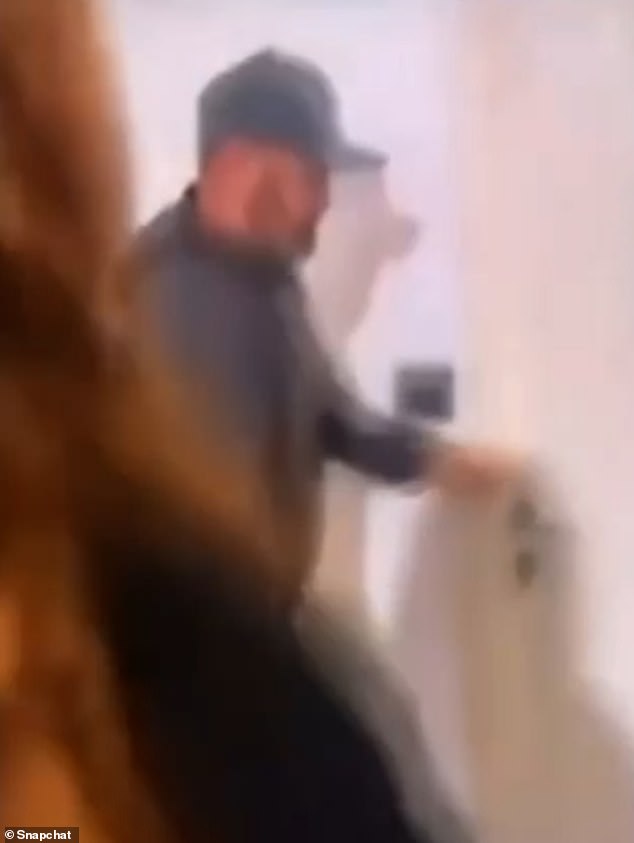 Wayne Rooney is filmed letting a mystery woman into his luxury rented flat in Devon amid Coleen's concerns about his 'single lifestyle' hundreds of miles from home.