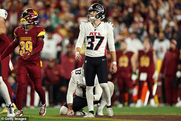 Bizarre moment: Falcons fans celebrate at the bar after thinking they scored the winning field goal… but quickly realize their mistake.