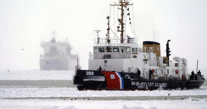 Loader in motion after he was released from ice in the Erie frozen lake