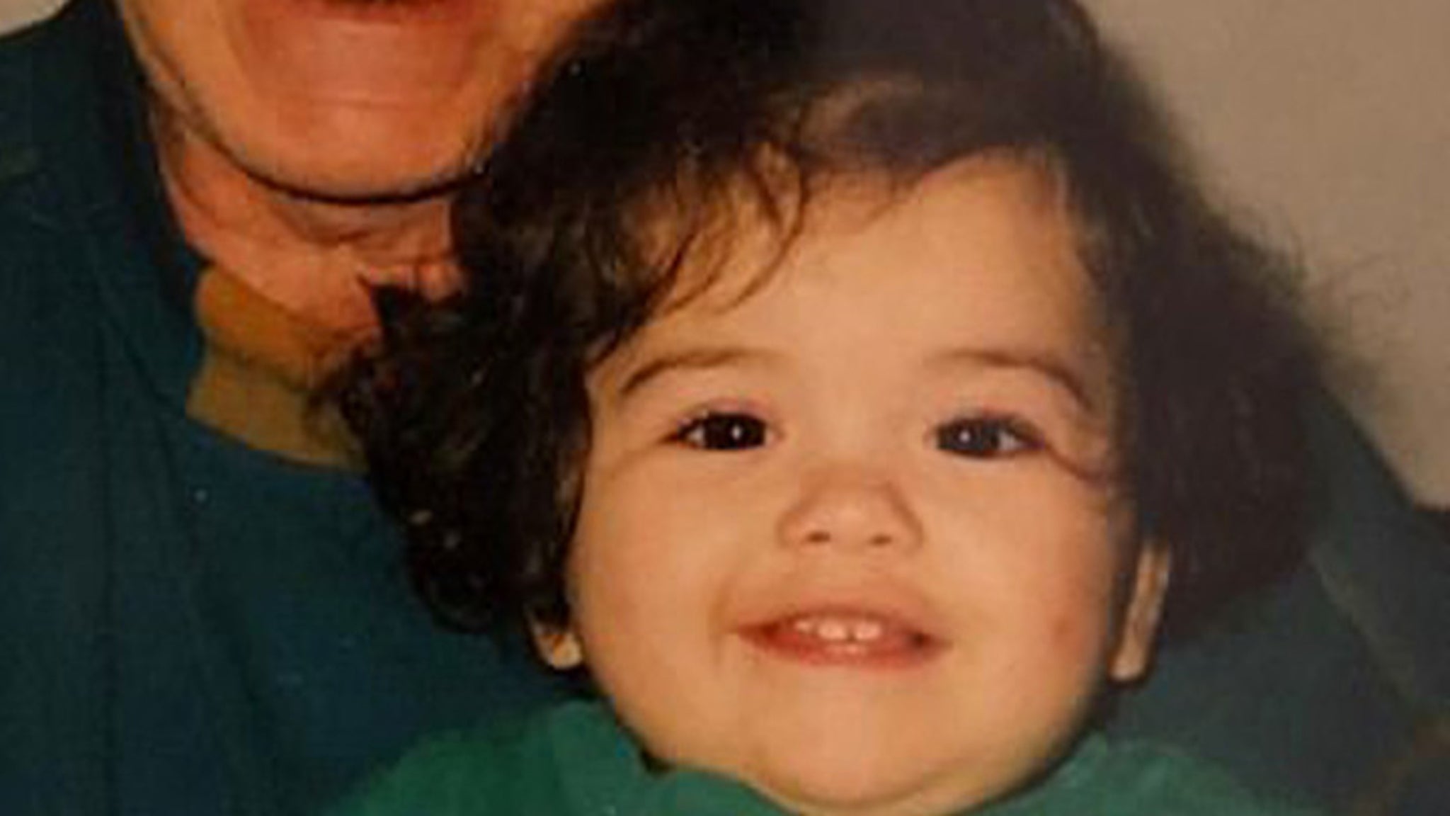 Guess who this curly cutie has turned into!