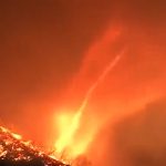 A fire tornado appears in the midst of a massive inferno that devastates Los Angeles