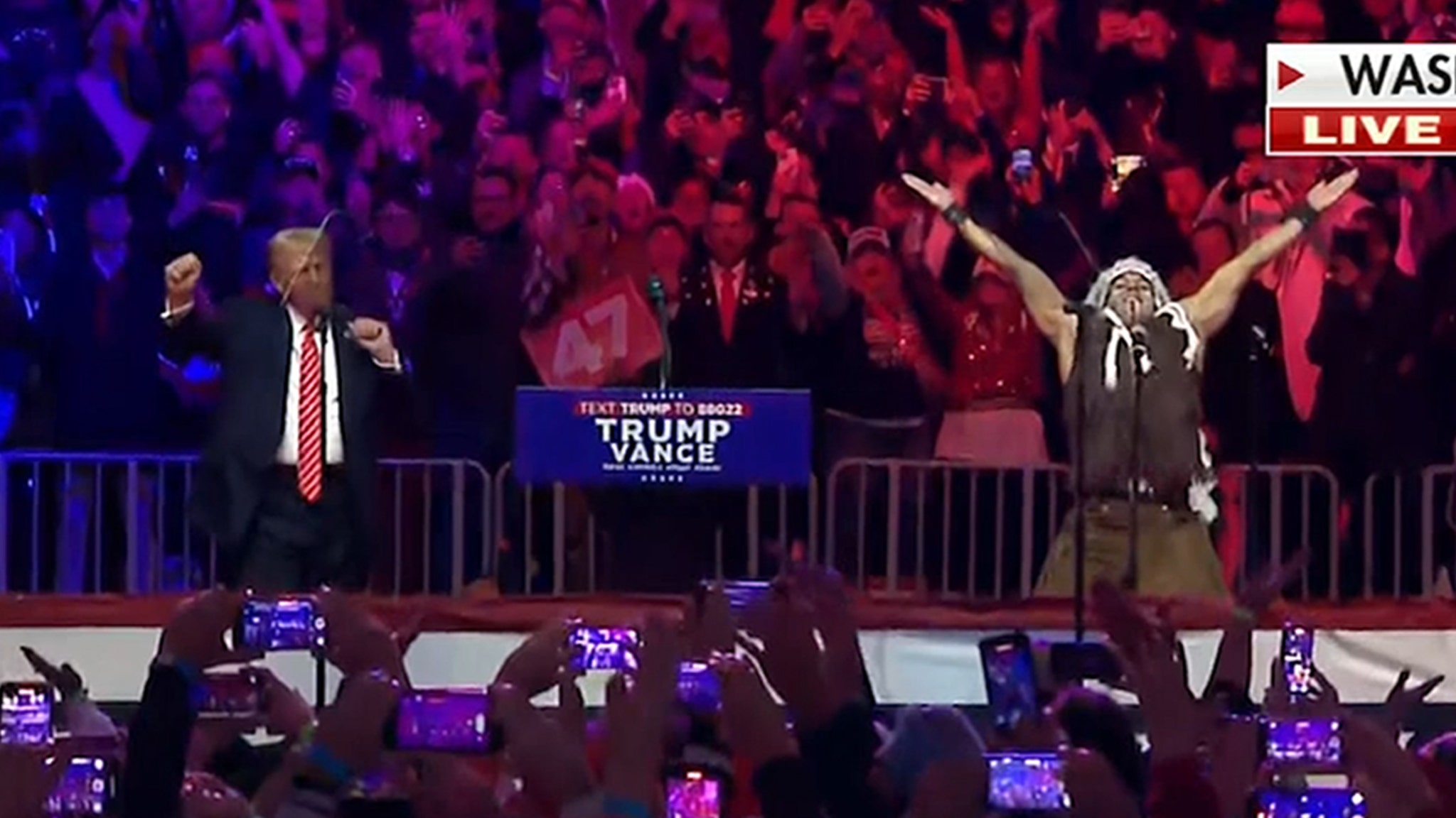 Donald Trump dances with villagers during victory rally