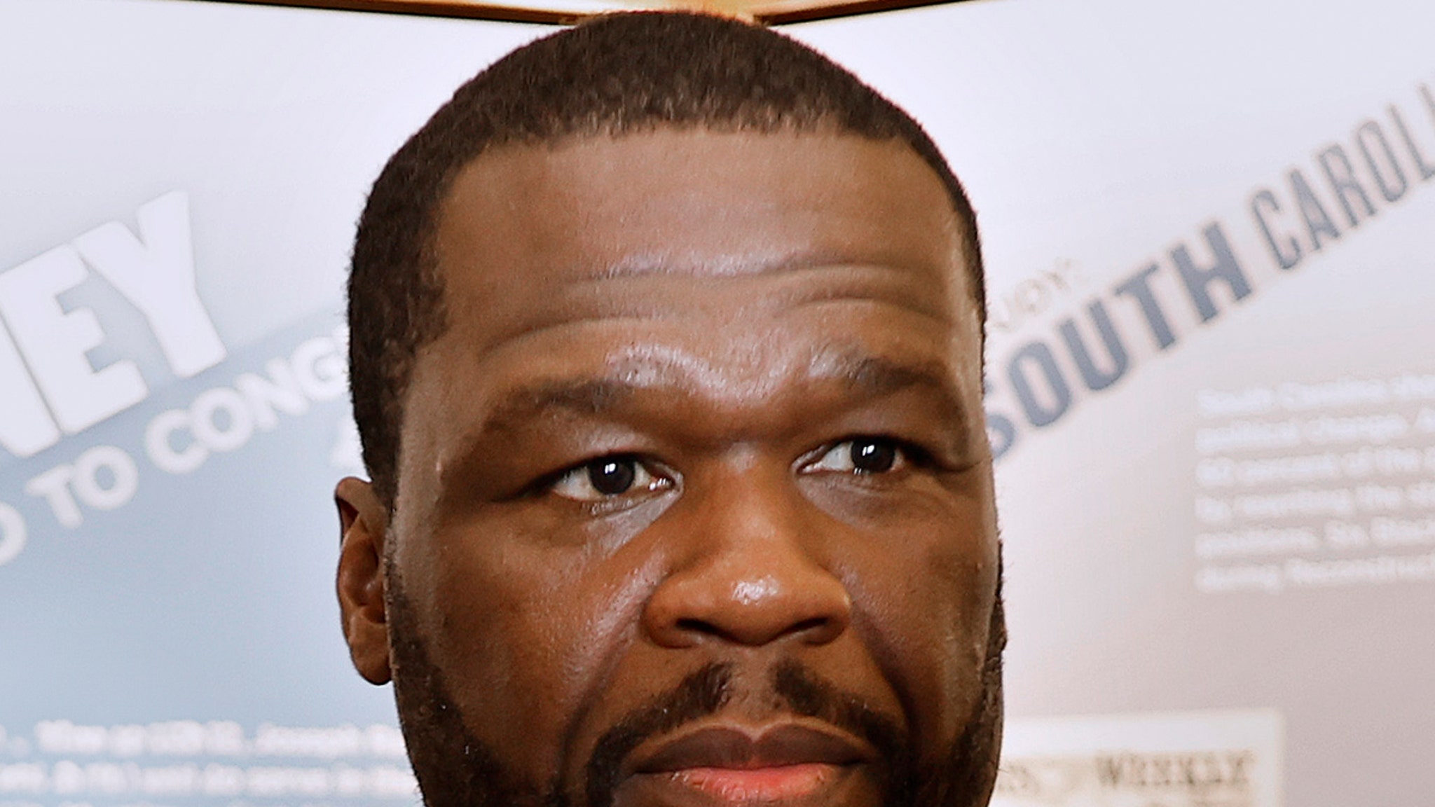 50 cents for bodily harm by Photogo, who claimed that the rapper's SUV hit him