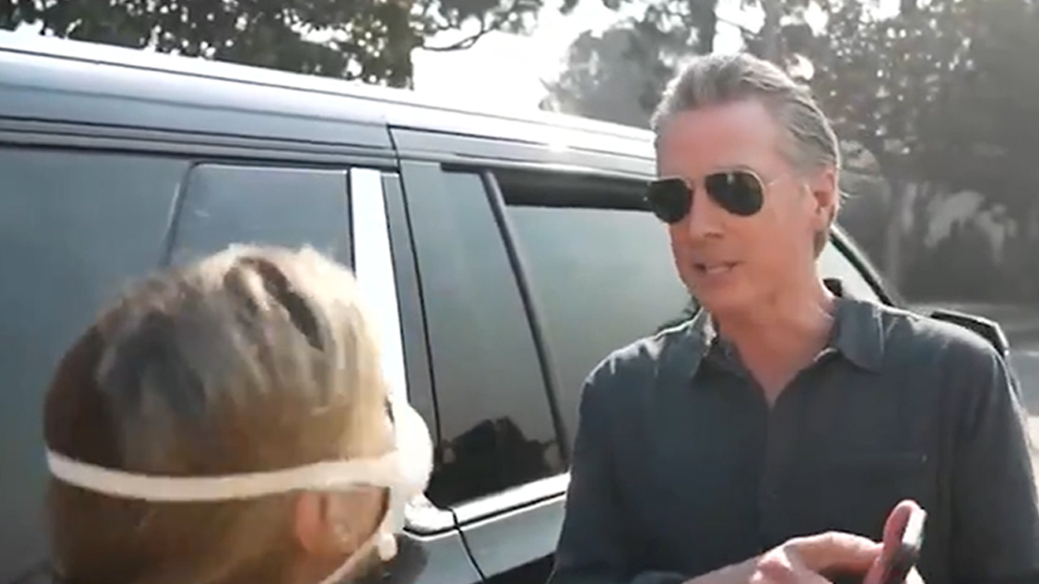 Gov. Gavin Newsom is confronted with a wildfire victim in California and demands a conversation with the president