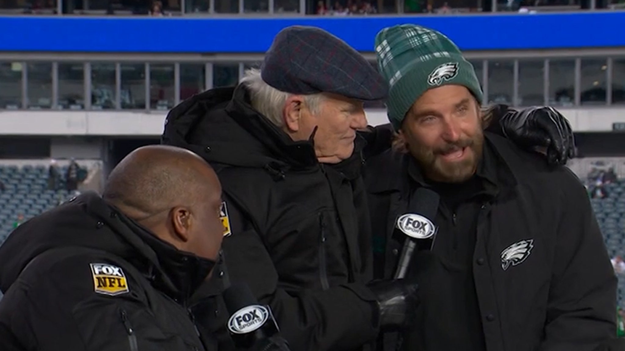 Bradley Cooper stops by the Fox NFL pregame set and hugs former co-star Terry Bradshaw