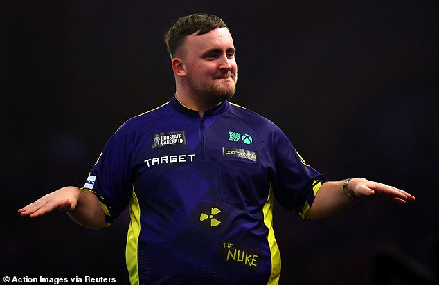 Luke Littler copies Didier Drogba's iconic celebration after making a strong start to his World Darts Championship quarter-final against Nathan Aspinall.