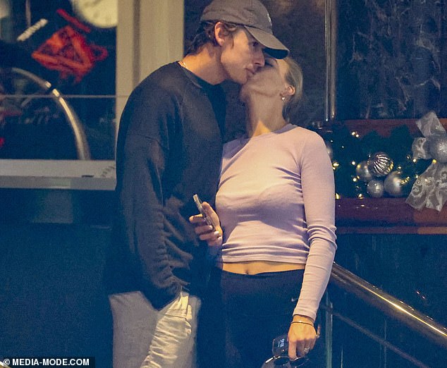 Sealed with a kiss! Tennis power couple Alex de Minaur and Katie Boulter enjoy a night out after their recent engagement