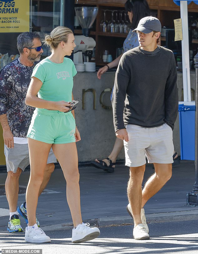 British tennis star Katie Boulter shows off her HUGE diamond engagement ring while out for a walk with her Australian fiancé Alex de Minaur.