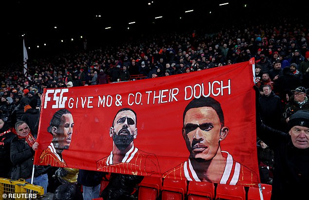 Liverpool fans demand FSG act on Mo Salah, Virgil van Dijk and Trent Alexander-Arnold as Kop poster tells club owners to 'spend the money' for new contracts.