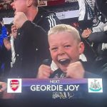 A nine-year-old Newcastle fan was caught missing school for a key match after Sky cameras showed him beaming with joy at the Geordie victory.