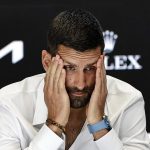 Novak Djokovic refuses to answer questions over explosive 'poisoning' allegations while in 2022 vaccine 'jail' in acrimonious pre-Australian Open press conference