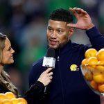 Fans criticize ESPN reporter who 'makes fun of race' for 'totally unacceptable' question to Notre Dame coach Marcus Freeman