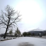 Ohio State and Texas fans face dangerous conditions as freezing cold brings snow and sleet to Cotton Bowl