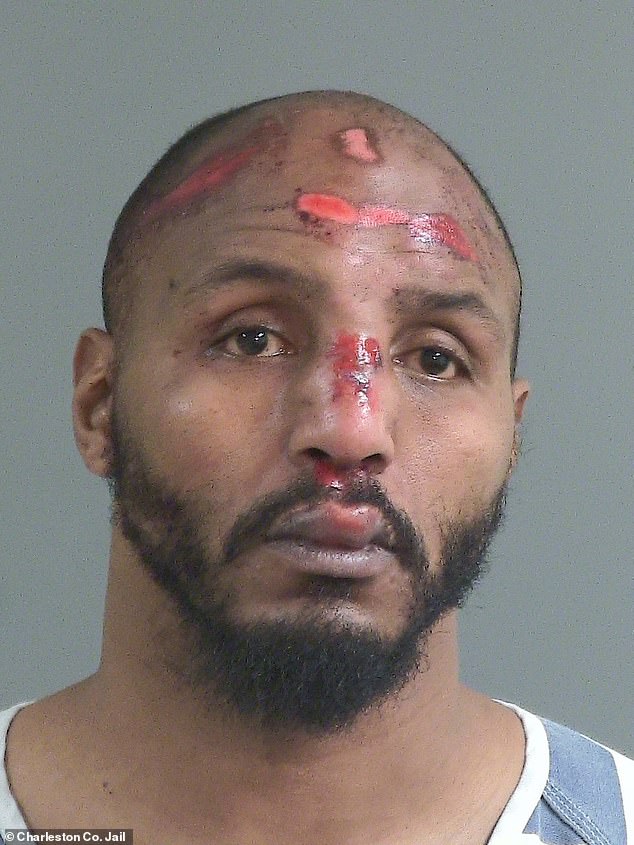 Former NFL star Robert Quinn appears in gruesome mugshot after 'attempting to flee accident scene' in South Carolina