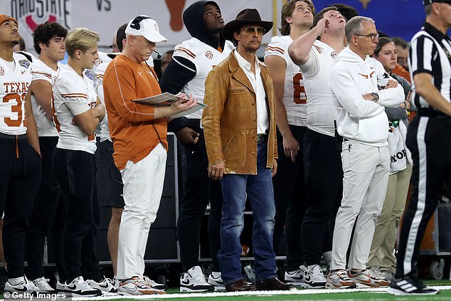 Fans were divided over Matthew McConaughey's air time on ESPN as he watches Texas fall to Ohio State in the Cotton Bowl.