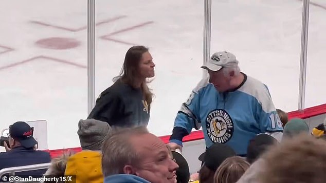 Penguins fan expelled in wild scene after 'stealing child's puck and being threatened by child's mother'