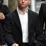 Australian champion sports star Danny Nikolic is charged after allegedly becoming trapped in a house while trying to steal jewelery and luxury handbags.