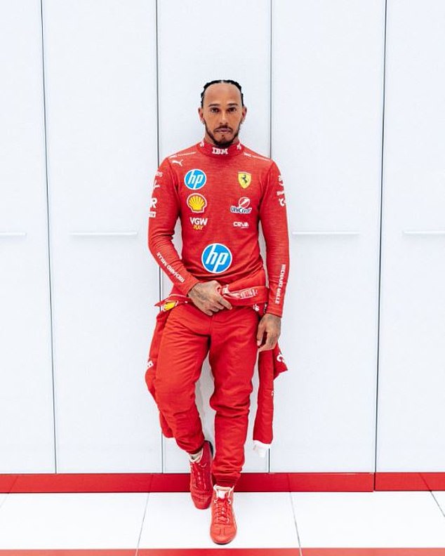 Lewis Hamilton shares a four-word message as he poses for his first photo in Ferrari's iconic red racing suit.