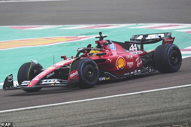 Lewis Hamilton pictured driving a Formula One Ferrari for the first time as the seven-time world champion arrives at the Scuderia's iconic track after his performance at Maranello.