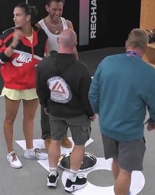 Fans attack Aryna Sabalenka and her coaches team for a video that seems to show them pretending to urinate in their Australian Open trophy.