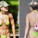 Rita Ora shows off her body in a skimpy green bikini on vacation in Australia