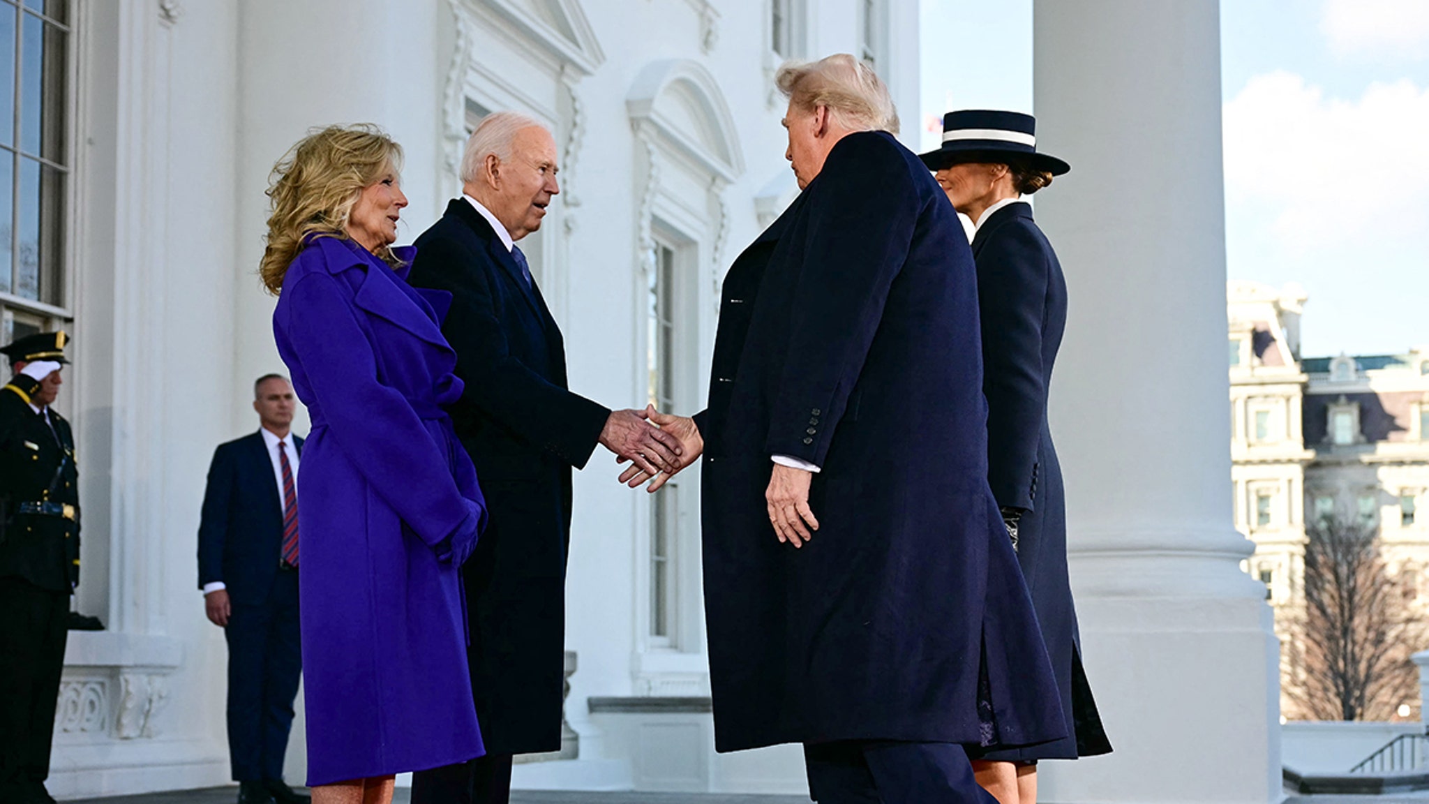 President-elect Trump shakes hands with Joe Biden, Vance greets Harris