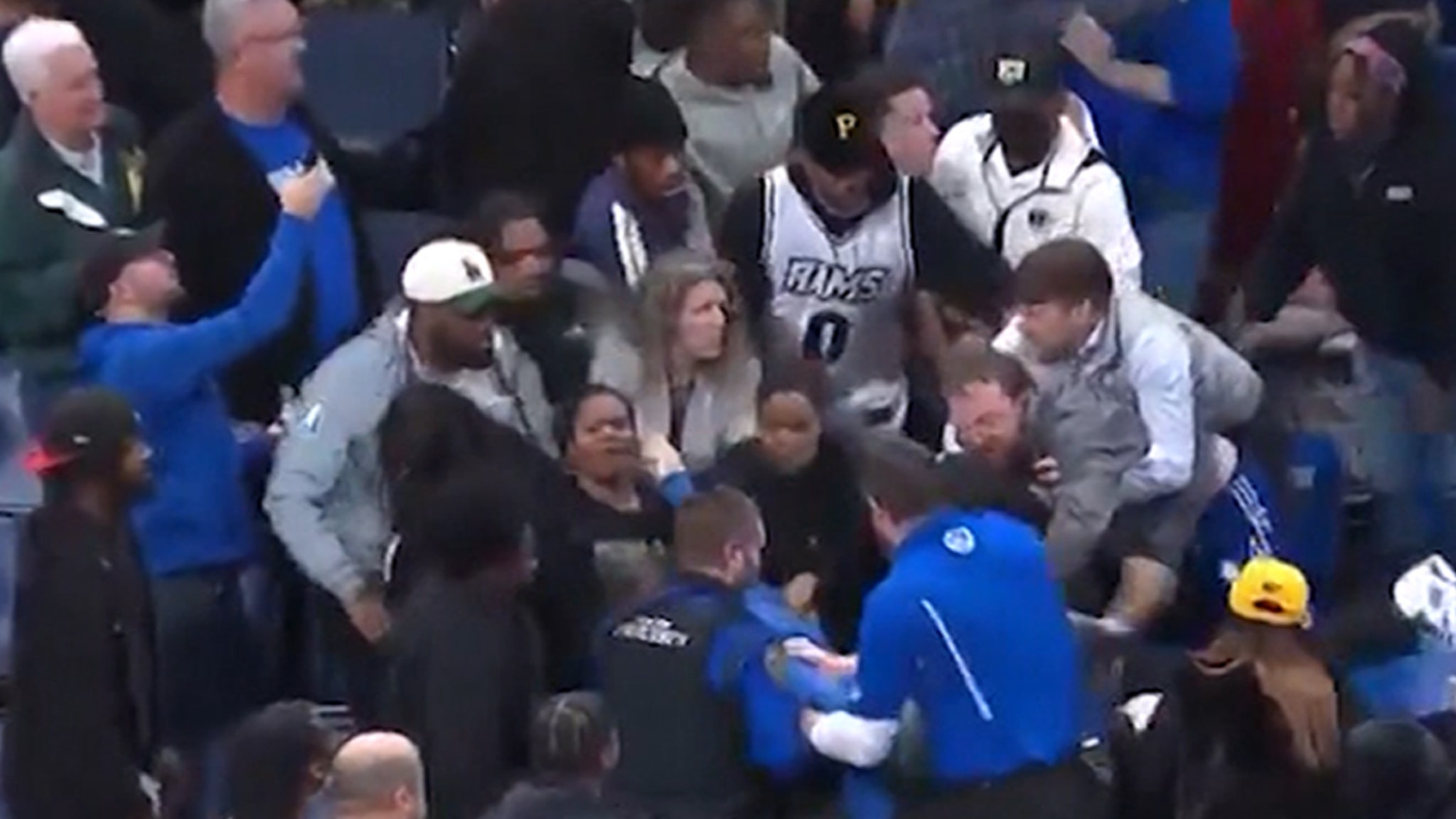 Fans fight during the VCU against Saint Loui's men's basketball game