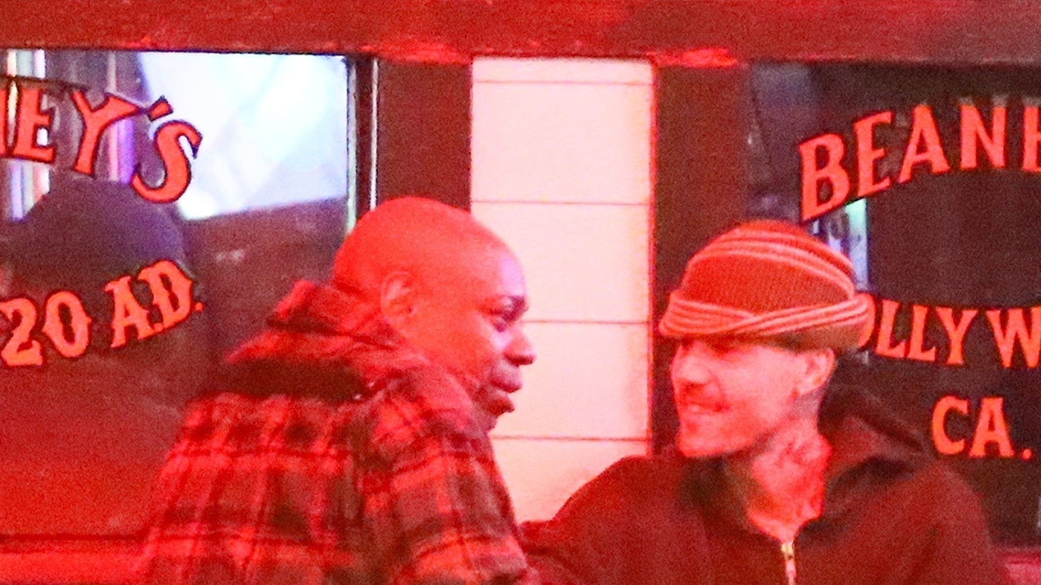 Justin Bieber takes a break of smoke while he catches up with Dave Chappelle