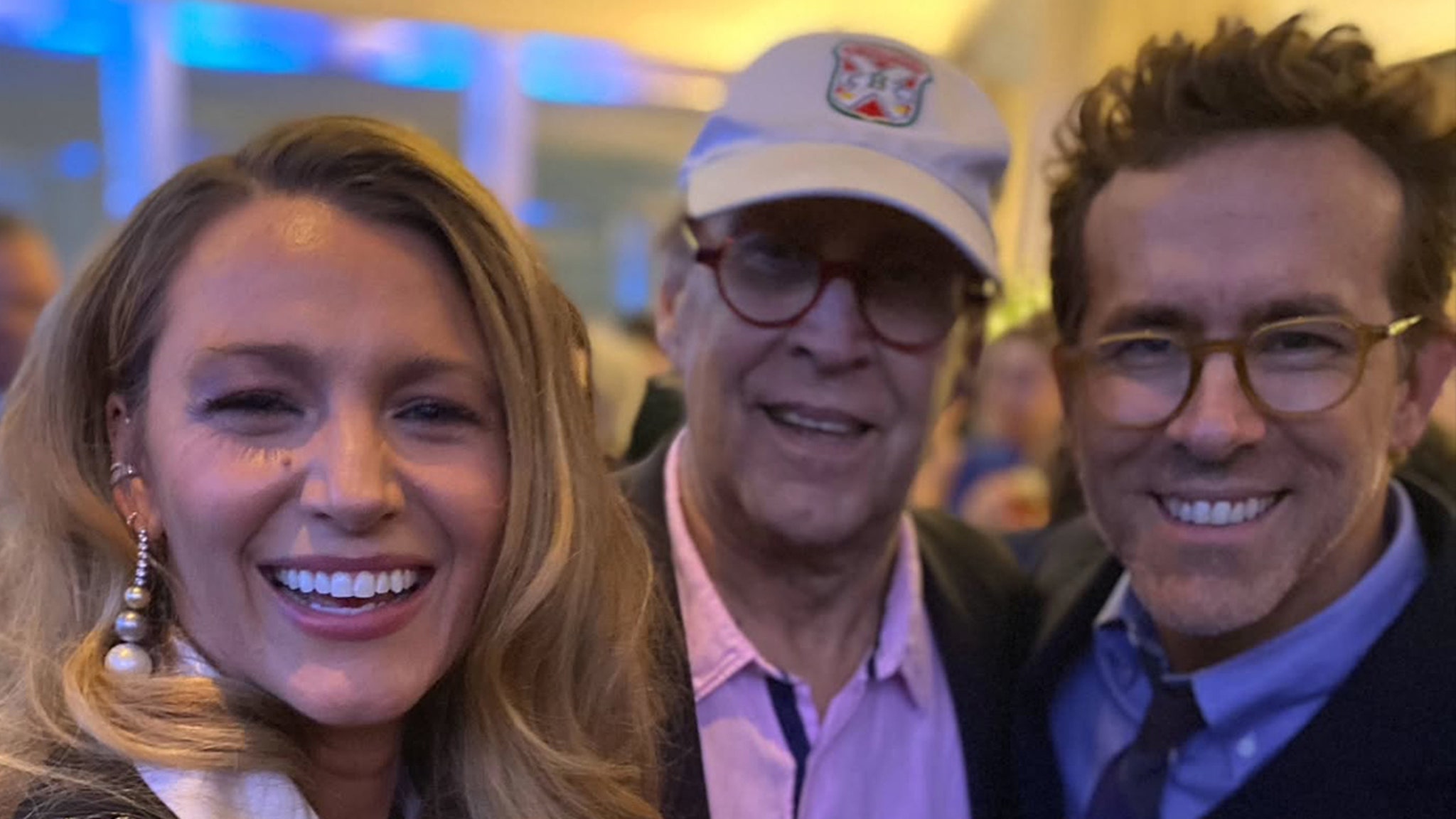 Blake Lively and Ryan Reynolds visit Chris Rock's birthday party, posing with Chevy Chase