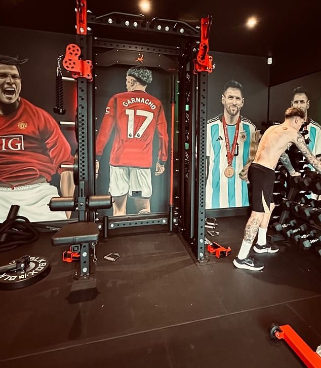 In the photo: the gym at Alejandro Garnacho's house pays tribute to both Cristiano Ronaldo and Lionel Messi in impressive murals … as fans claim that Man United Star is 'sitting in the fence' in the debate of the goat