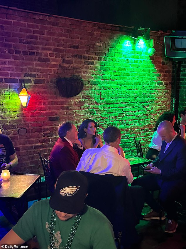 Bill Belichick and Jordon Hudson stun fans when they arrive at the iconic New Orleans bar after the NFL honors