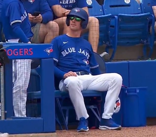 Chris Bassitt of Blue Jays serves humiliating punishment during the game for the defeat of fantasy football