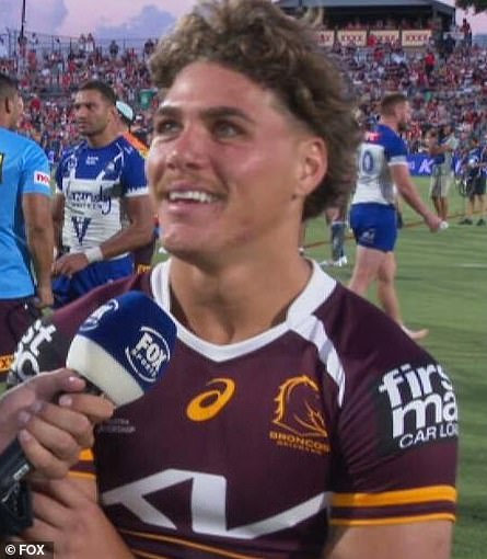 Brisbane's superstar, Reece Walsh, slides to rival coach Shane Flanagan after the victory of the Broncos