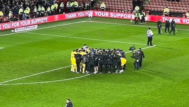 Leeds United's captain Ethan Ampadu, delivers a scream of rally to teammates inside Huddle after the final whistle of his return victory over Sheffield United