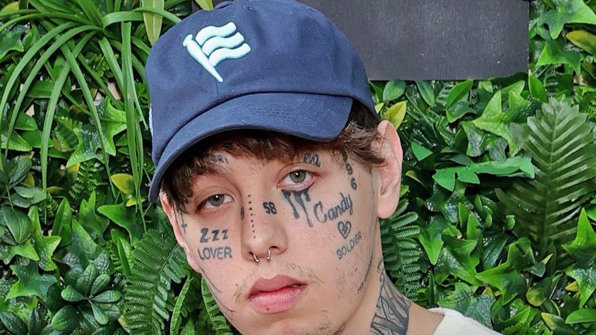 Lil Xan was charged with 2 crimes to throw the microphone and fan kick in the face