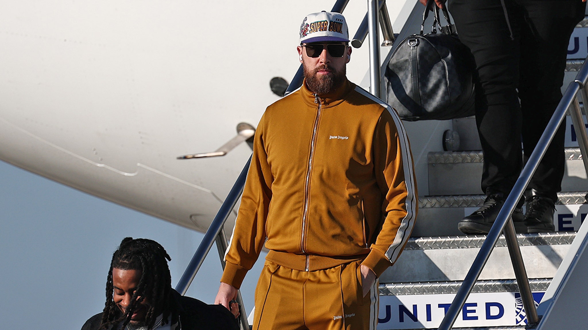 Travis Kelce ends up in New Orleans for Super Bowl, outfit a tribute to Taylor Swift?