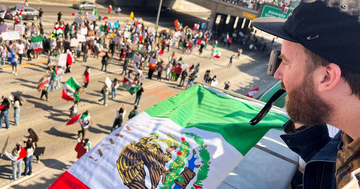 Thousands of demonstrators gather against Trump's aggressive immigration policy in downtown Los Angeles