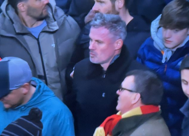 Jamie Carragher cuts the figure with a stone face in the kop while seeing that Liverpool is knocked out of the PSG Champions League in Anfield