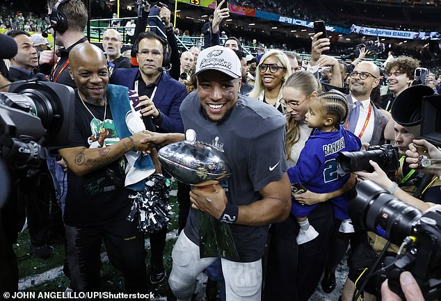 Eagles fans react after the team becomes visiting Trump in the White House to celebrate the Super Bowl victory