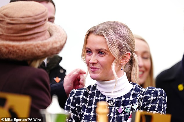 Queen Camilla shares a warm hug with Charlotte Giles, dead jockey girlfriend Michael O'Sullivan, at the Cheltenham festival after her tragic death in February at the age of 24 years