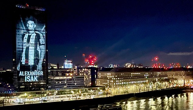 The Newcastle stars projected in the building with River Thames by Shirt Sela sponsors before the Capabao Cup final against Liverpool