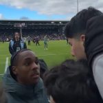 Tottenham Forward Mathys Tel addresses angry supporters at the visiting end and the broadcast message after the sad 2-0 defeat by Fulham