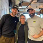 Fans break Ben Stiller for an image with Travis and Jason Kelce before the appearance of New Heights